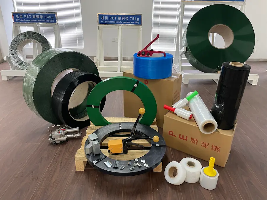 Steel, PET and PP strapping with matching seals Steel strapping, PET strapping, strapping seals and tools from JUHONG displayed together