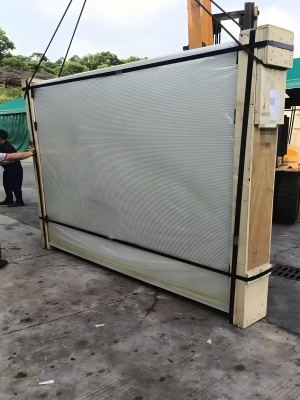 Blue and waxed steel strapping securing float glass packs for safe transportation