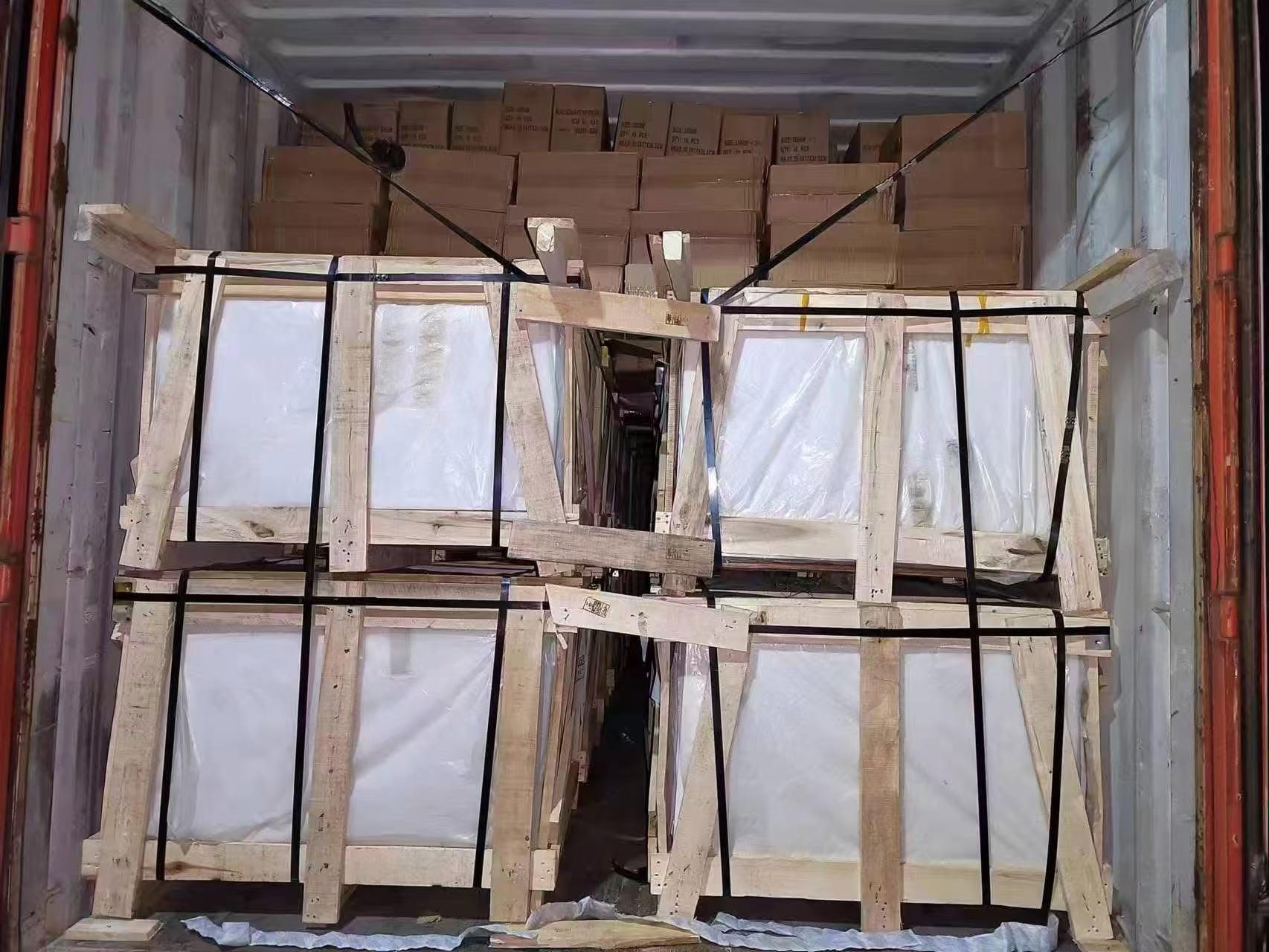 Palletized goods secured with blue and waxed steel strapping for improved load stability
