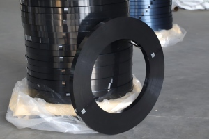 Black Painted Steel Strapping (ribbon-Wound) bulk loaded on a wooden pallet for heavy-duty industrial use