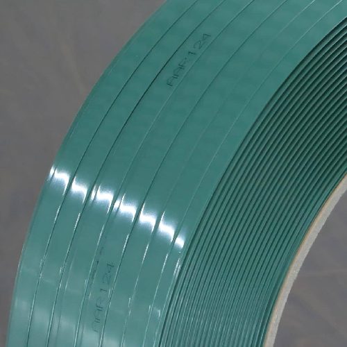 Close-up of Juhong PET strapping core with official AAR 124 marking, ensuring compliance for heavy-duty rail transport