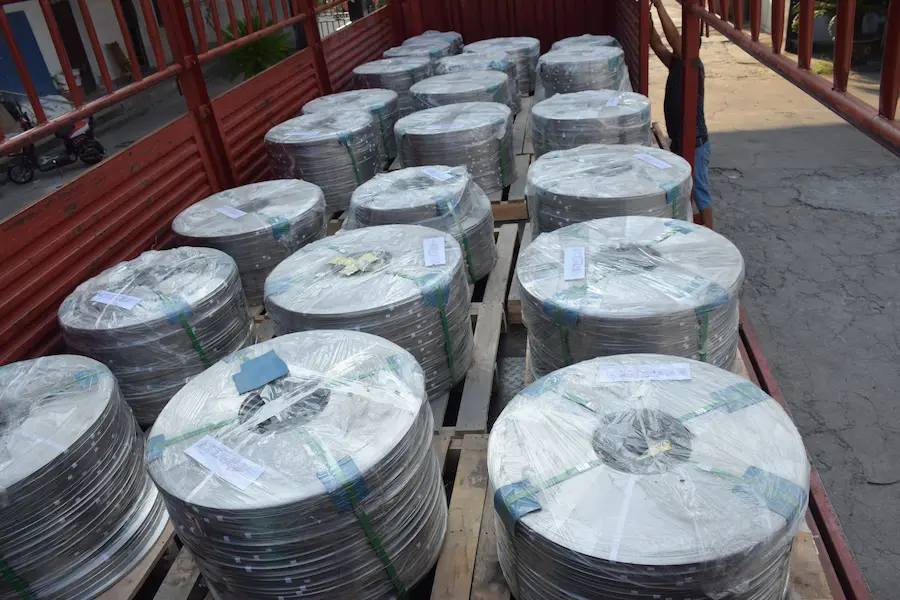Stainless steel banding coils loaded on pallets for truck transportation