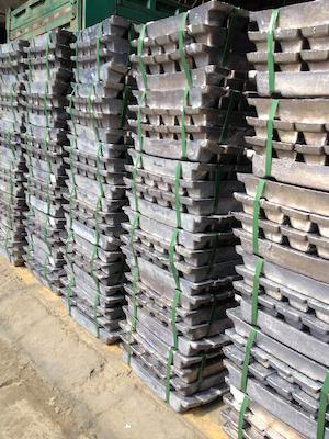 Heavy-duty PET strapping applied on aluminum ingot bundles in a smelting plant, replacing 1 1/4 inch steel strapping