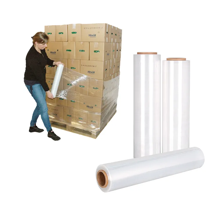 A warehouse worker demonstrating the application of Juhong hand stretch film to secure a pallet of cartons, showing excellent film clarity and ease of use - Juhong Packing